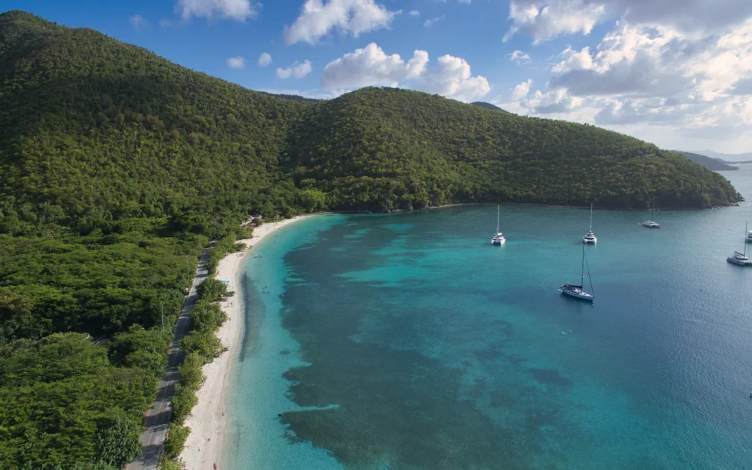 St John ferry schedule guide: turquoise bay and green hills seen from above on a sunny day