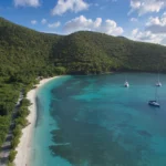St John ferry schedule guide: turquoise bay and green hills seen from above on a sunny day